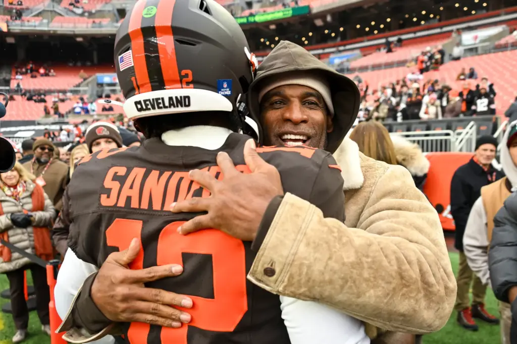 Colorado head coach Deion Sanders and Cleveland Browns QB Shedeur Sanders