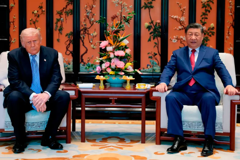 Chinese President Xi Jinping, right, and U.S. President Donald Trump attend a meeting on the sidelines of their visit to the Zhongnanhai Garden in Beijing, Friday, May 15, 2026. (Evan Vucci/Pool Photo via AP)