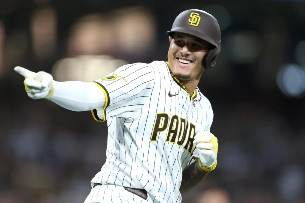 Manny Machado #13 of the San Diego Padres reacts after hitting a solo homerun during the third inning of a game against the San Diego Padres at Petco Park on August 20, 2025 in San Diego, California. (Photo by Sean M. Haffey/Getty Images)