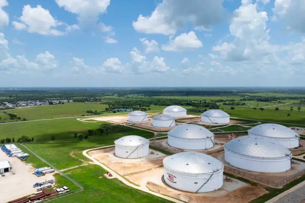 In an aerial view, oil storage tanks are seen at the Enterprise Sealy Station on June 19, 2025, in Sealy, Texas.