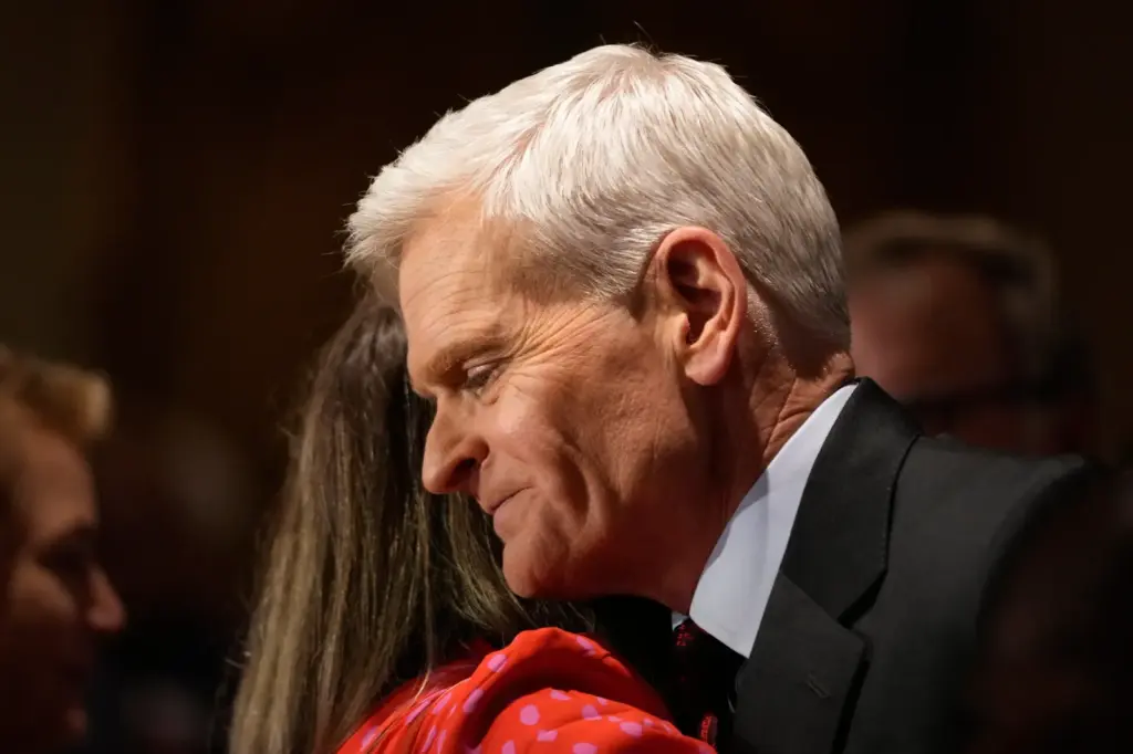 Senator Bill Cassidy hugs a supporter during an election night watch party on May 16, 2026, in Baton Rouge, Louisiana.