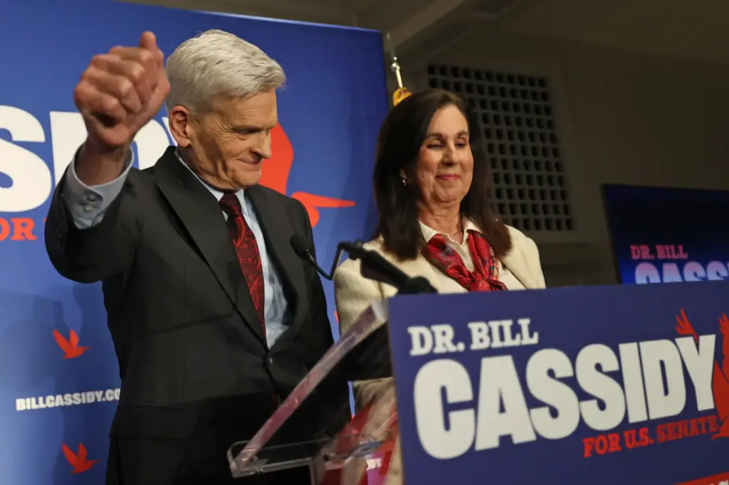 Senator Bill Cassidy, a Louisiana Republican, seen with his wife Dr. Laura Cassidy, addresses his supporters as he concedes his primary election contest during an event at Boudreaux's Caterers on May 16 in Baton Rouge, Louisiana. (Photo by Michael DeMocker/Getty Images)