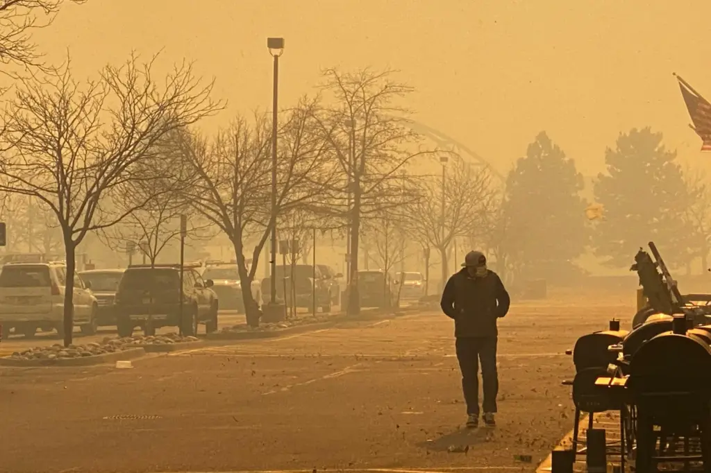 The Marshal Fire in Louisville, Colorado, on December 30, 2021, caused smoke and ash, turning a normally blue sky into orange.