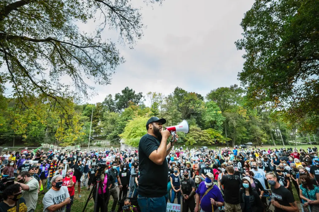 Kentucky U.S. Senate candidate Charles Booker speaks to protesters before a march to the Breonna Taylor memorial at Jefferson Square Park in Louisville, Kentucky, on October 10, 2020. (Photo by Jon Cherry/Getty Images)